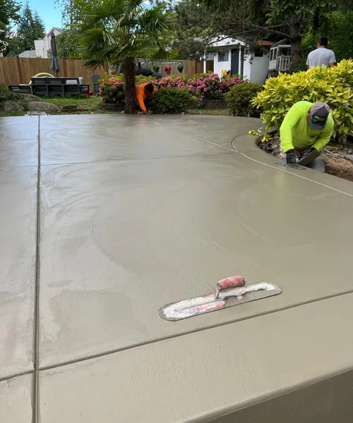 Broom finish patio and decorative borders in Covington 